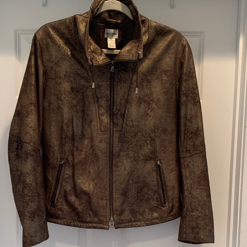 Chicos leather jacket size 2 bronze with brown under tone.